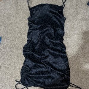 Black, leopard spotted dress.